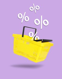 Image of Hot sale, special offer. Percent signs flying out of shopping basket against violet background