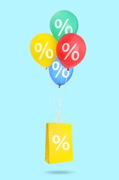 Image of Hot sale, special offer. Shopping bag and balloons with percent signs in air against light blue background