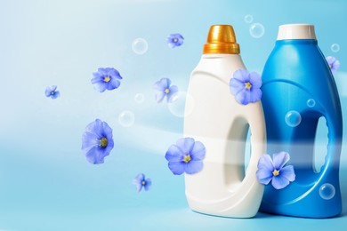 Image of Fabric softener advertising poster. Bottles of conditioner and flying flowers against light blue gradient background