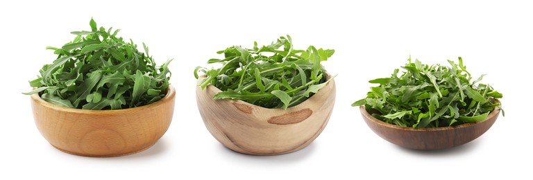 Image of Fresh green arugula in bowls on white background, set