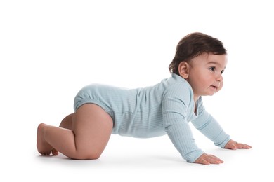 Photo of Cute little baby crawling on white background