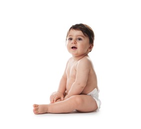 Photo of Cute little baby in diaper on white background