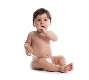 Photo of Cute little baby in diaper on white background