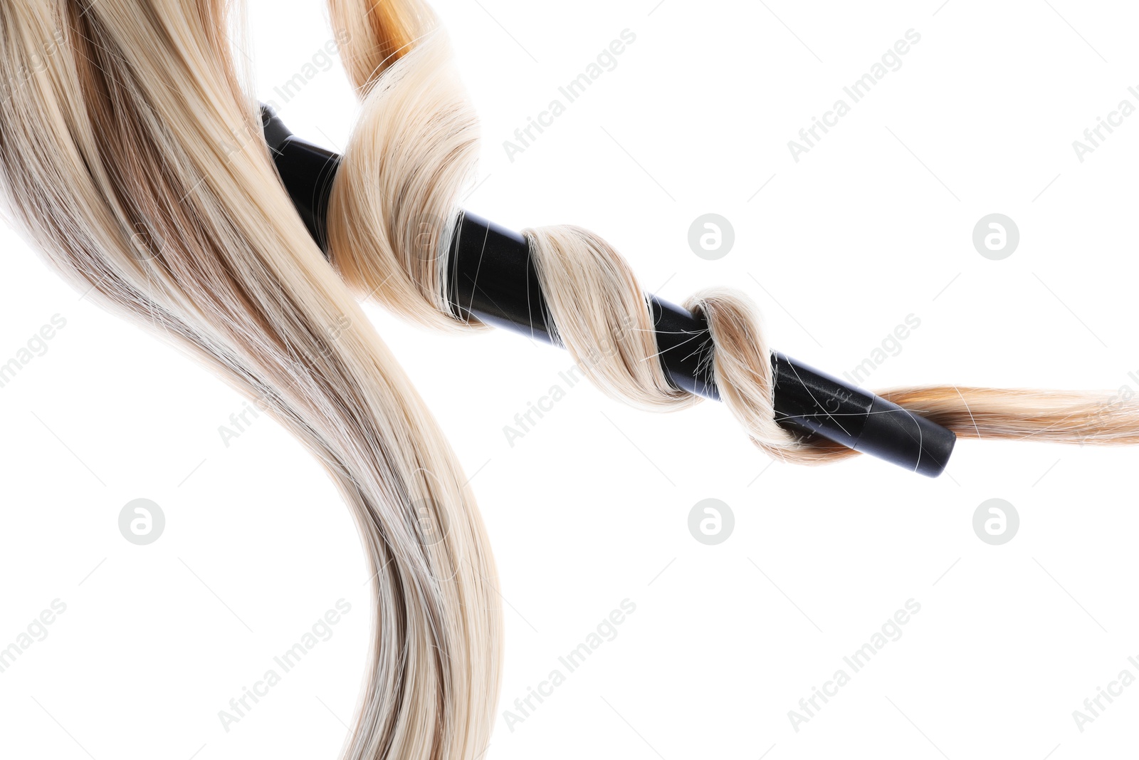 Photo of Curling iron with blonde hair lock isolated on white