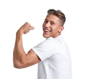 Photo of Strength. Happy man showing his biceps on white background