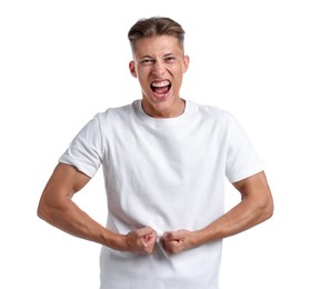 Photo of Strength. Emotional man showing muscles on white background