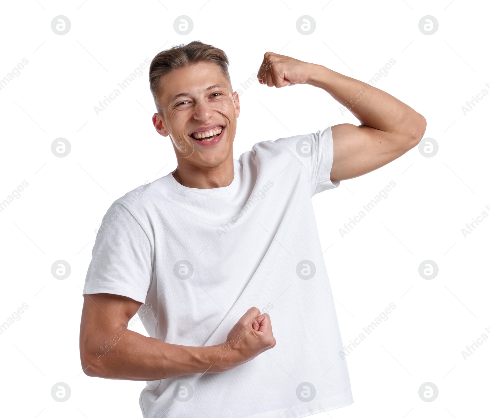 Strength. Happy man showing his biceps on white background Photo of Strength. Happy man showing his biceps on white background