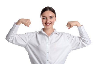 Photo of Strength. Happy businesswoman showing her biceps on white background