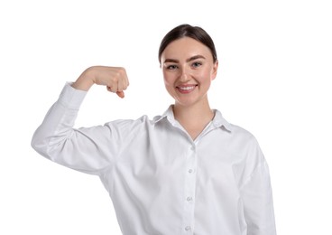 Photo of Strength. Happy businesswoman showing her biceps on white background