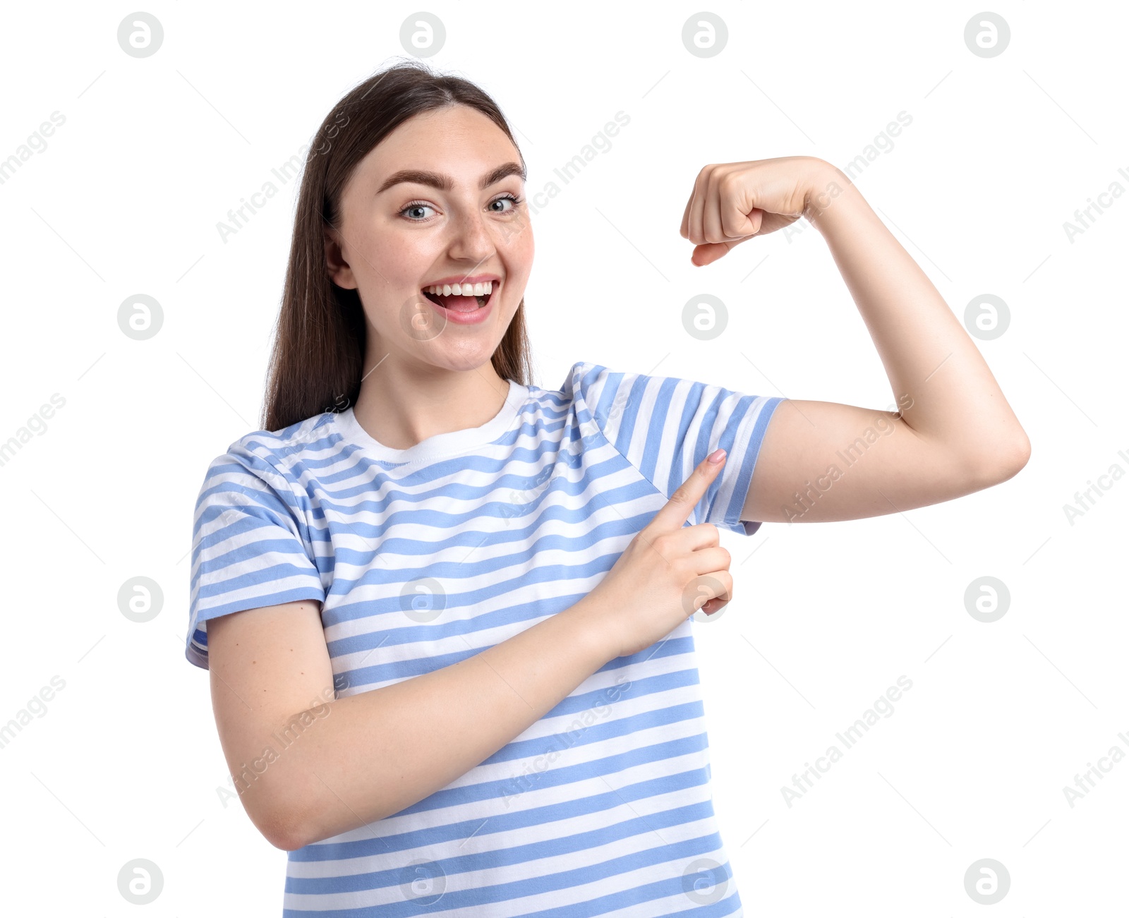 Strength. Happy woman pointing at her biceps on white background Photo of Strength. Happy woman pointing at her biceps on white background