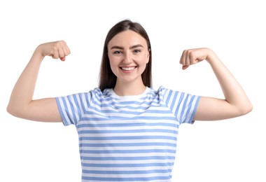 Photo of Strength. Happy woman showing her biceps on white background