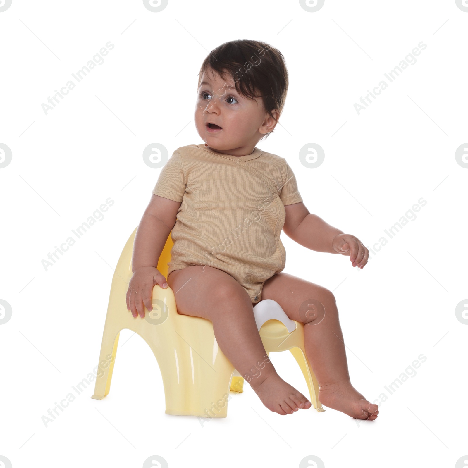 Photo of Cute little baby sitting on potty against white background