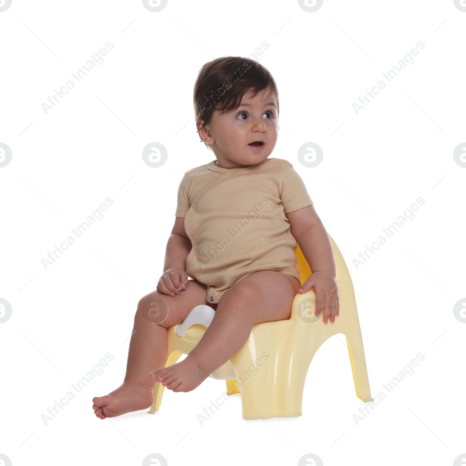 Photo of Cute little baby sitting on potty against white background