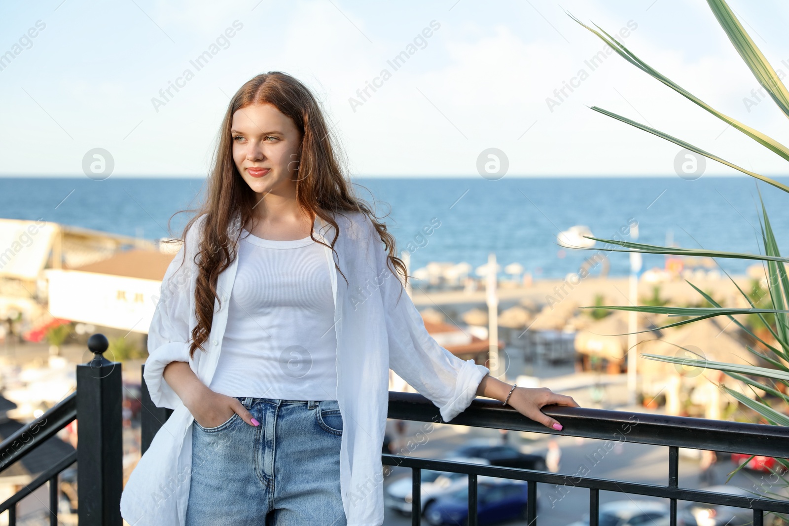 Portrait of beautiful teenage girl at sea resort Photo of Portrait of beautiful teenage girl at sea resort