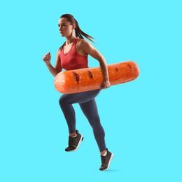 Image of Fit woman with big grilled sausage running against light blue background, creative collage. Poster for healthy lifestyle