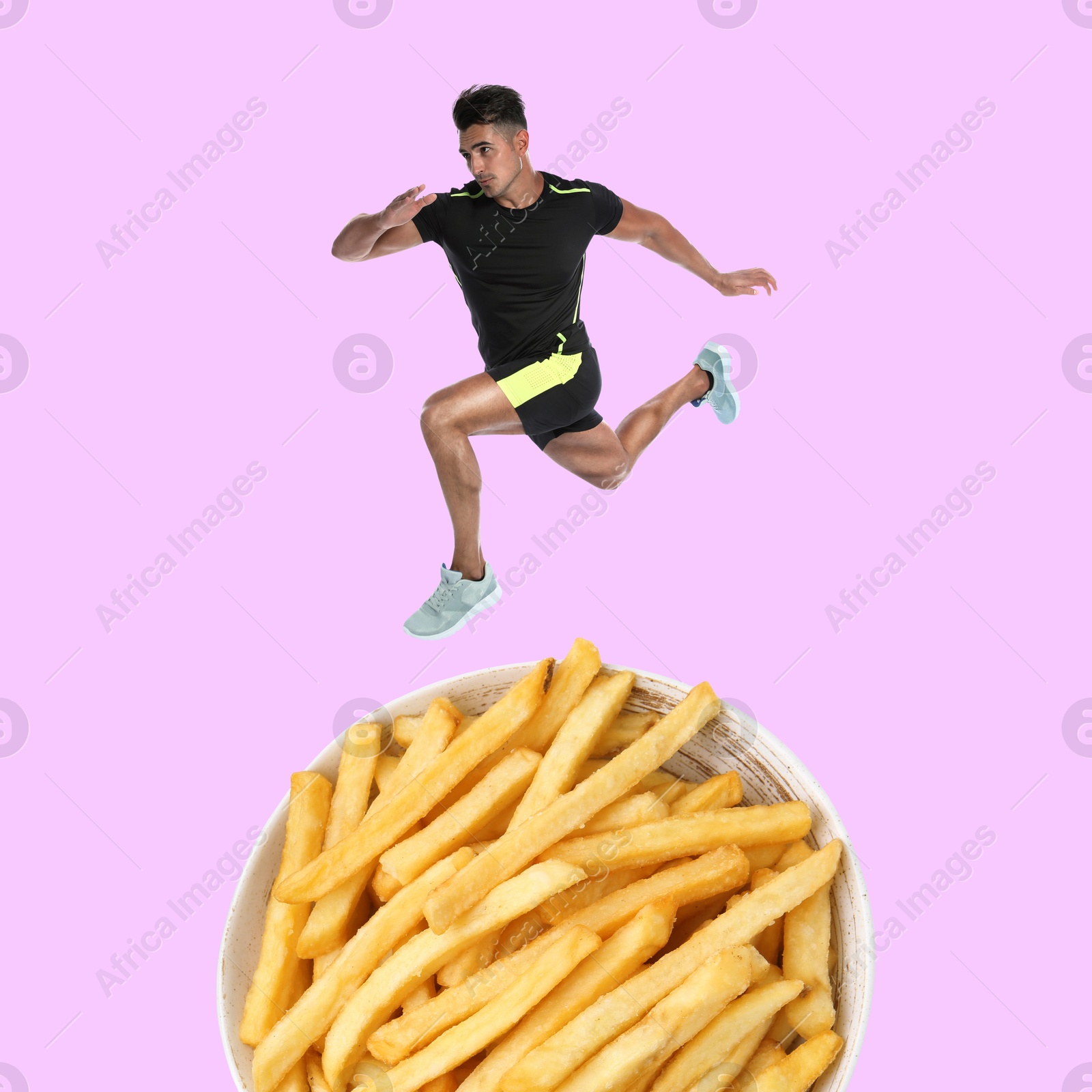 Sportsman running above bowl of French fries against light violet background, creative collage. Healthy lifestyle Image of Sportsman running above bowl of French fries against light violet background, creative collage. Healthy lifestyle