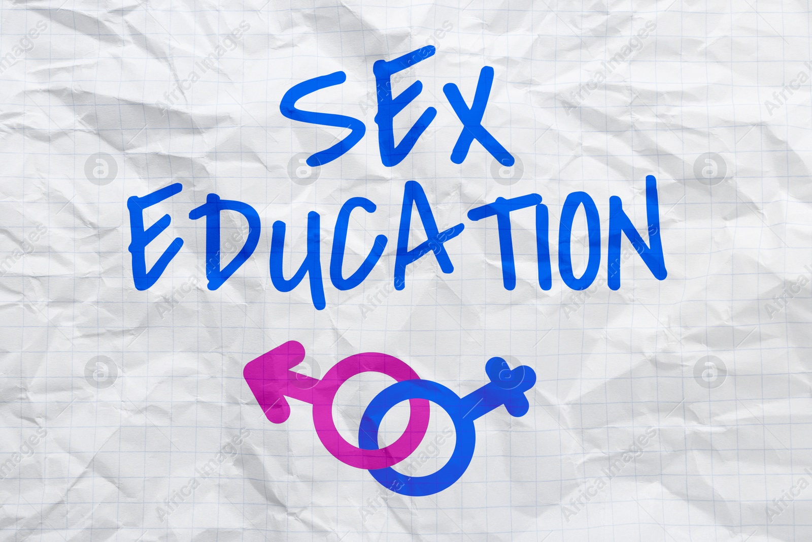 Sex Education inscription, male and female gender symbols on crumpled paper Image of Sex Education inscription, male and female gender symbols on crumpled paper