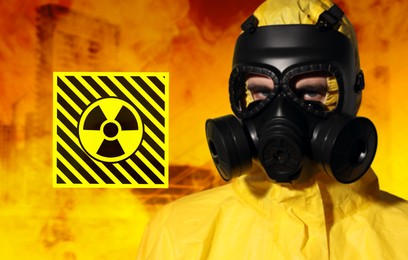 Image of Radioactive hazard, warning sign. Man in hazmat suit and gas mask against polluted city
