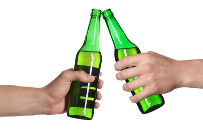 Image of Men clinking their bottles of beer together against white background