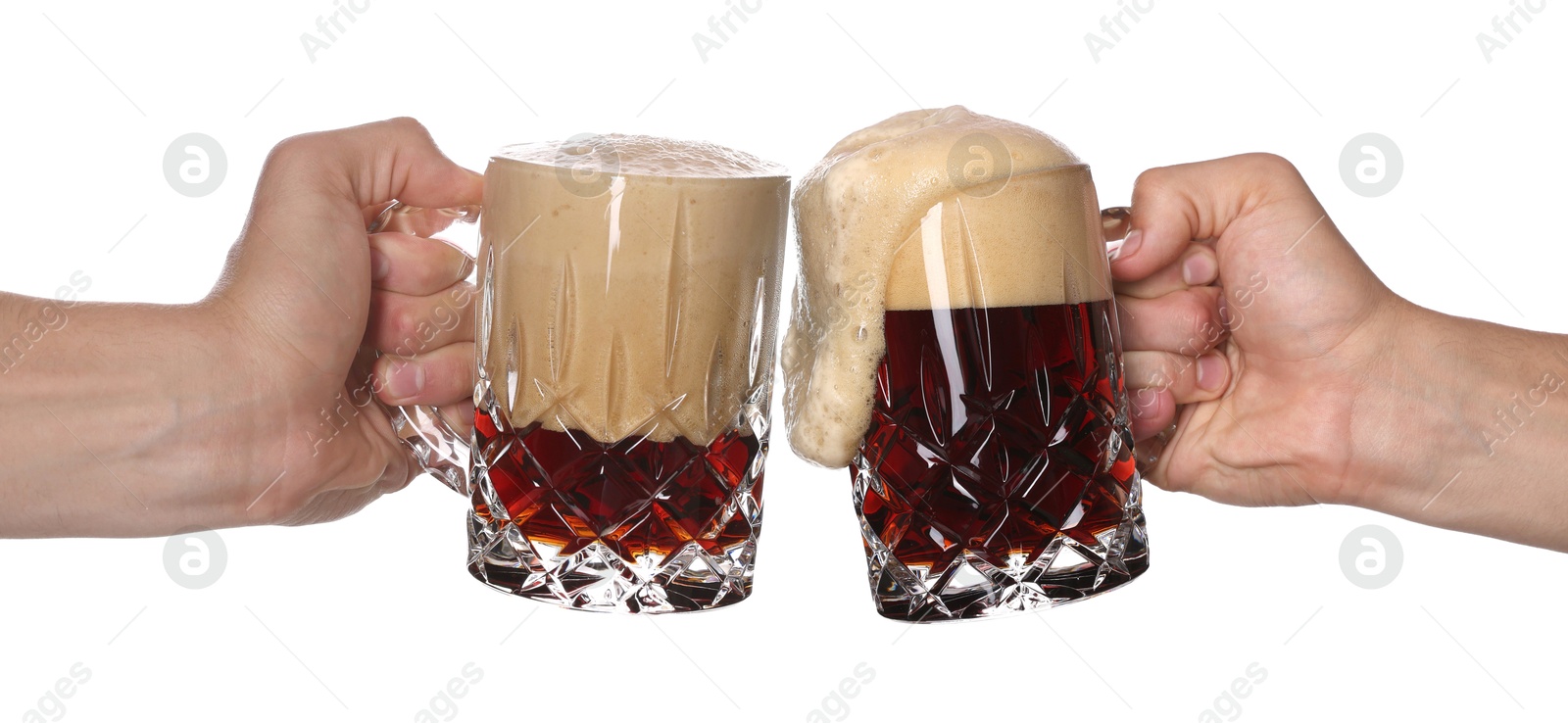 Men clinking their glasses of beer together against white background Image of Men clinking their glasses of beer together against white background