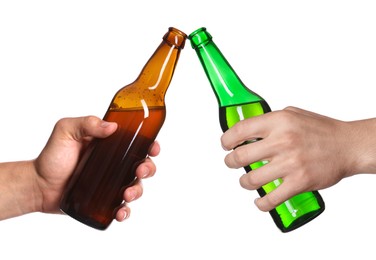 Image of Men clinking their bottles of beer together against white background