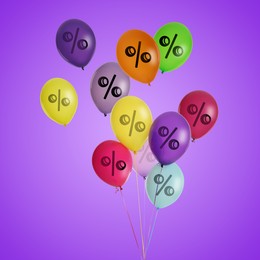 Image of Colorful balloons with percent signs against purple background. Hot sale, special offer
