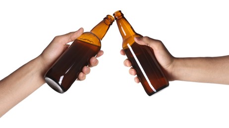 Image of Men clinking their bottles of beer together against white background