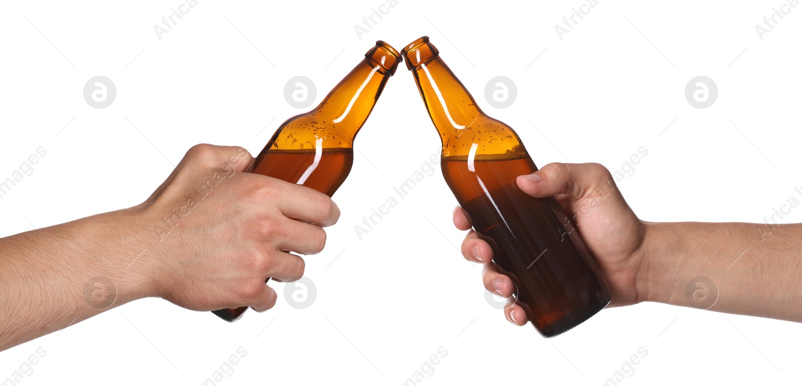 Men clinking their bottles of beer together against white background Image of Men clinking their bottles of beer together against white background