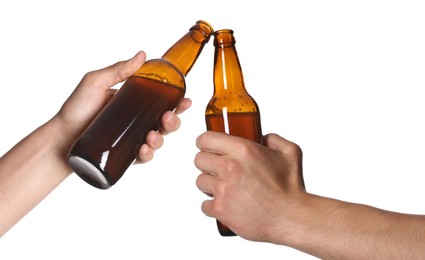Image of Men clinking their bottles of beer together against white background