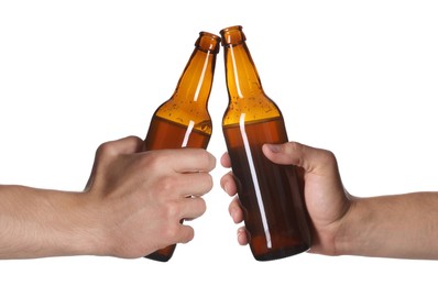 Image of Men clinking their bottles of beer together against white background