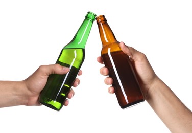 Image of Men clinking their bottles of beer together against white background