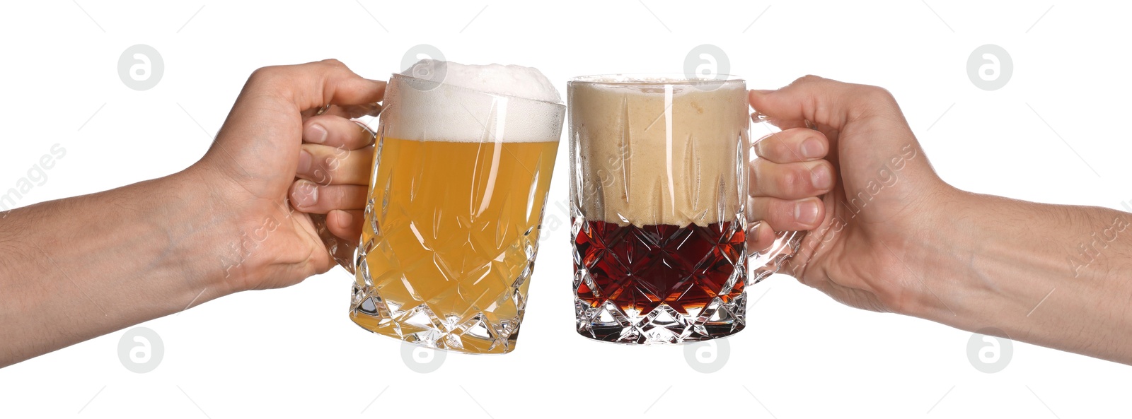 Men clinking their glasses of beer together against white background Image of Men clinking their glasses of beer together against white background