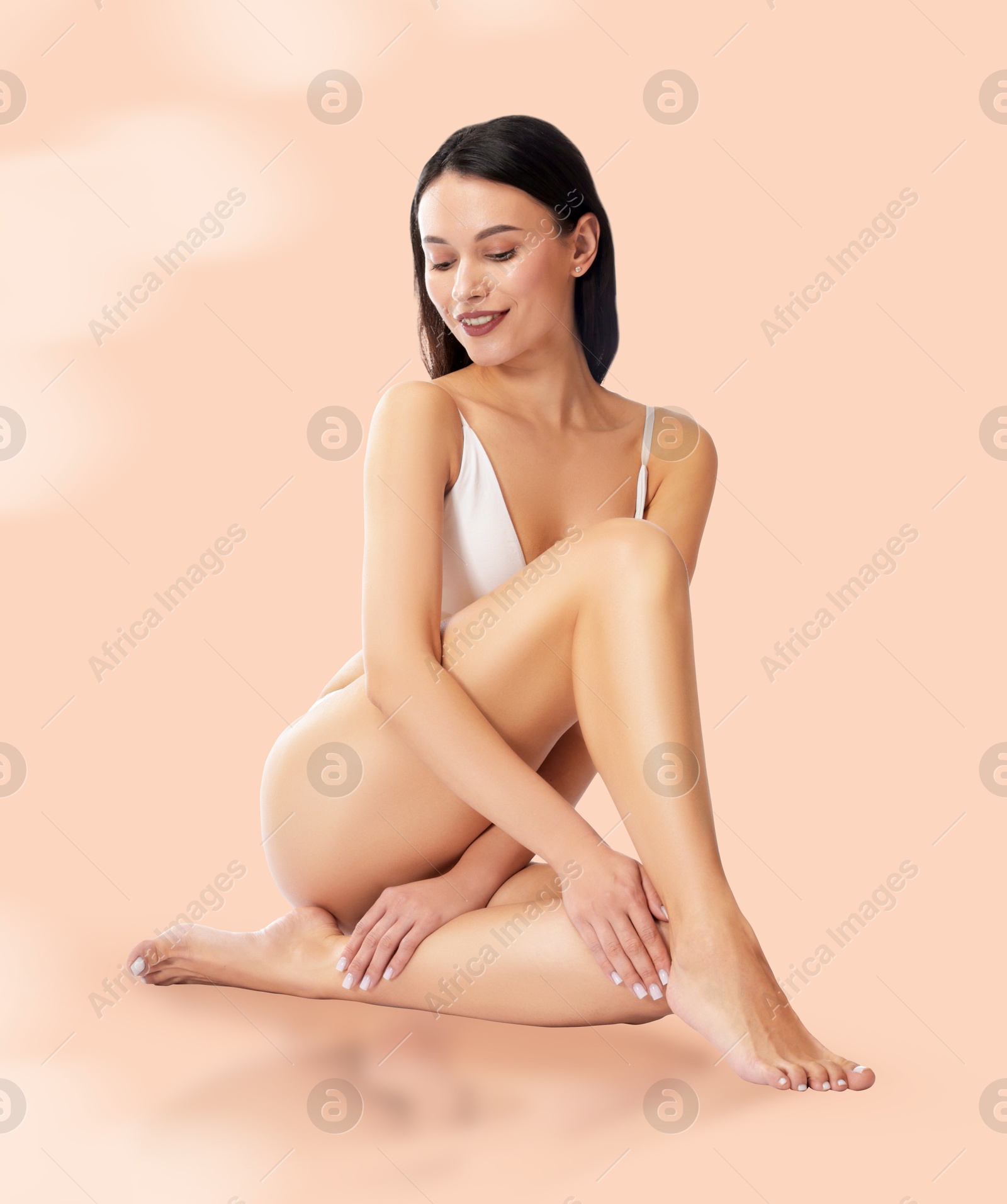 Image of Epilation. Woman showing smooth skin after hair removal against beige background