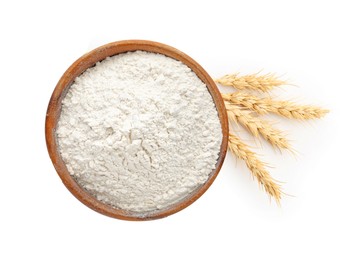 Image of Wheat flour in bowl and spikelets on white background, top view