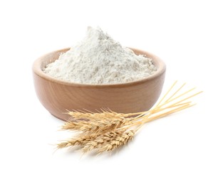 Image of Wheat flour in bowl and spikelets on white background