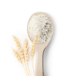 Image of Wheat flour in spoon and spikelets on white background, top view