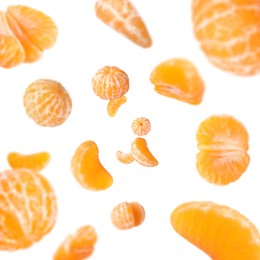 Image of Sweet tangerines whirling in air against white background