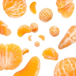 Image of Sweet tangerines whirling in air against white background