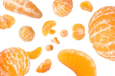 Image of Sweet tangerines whirling in air against white background
