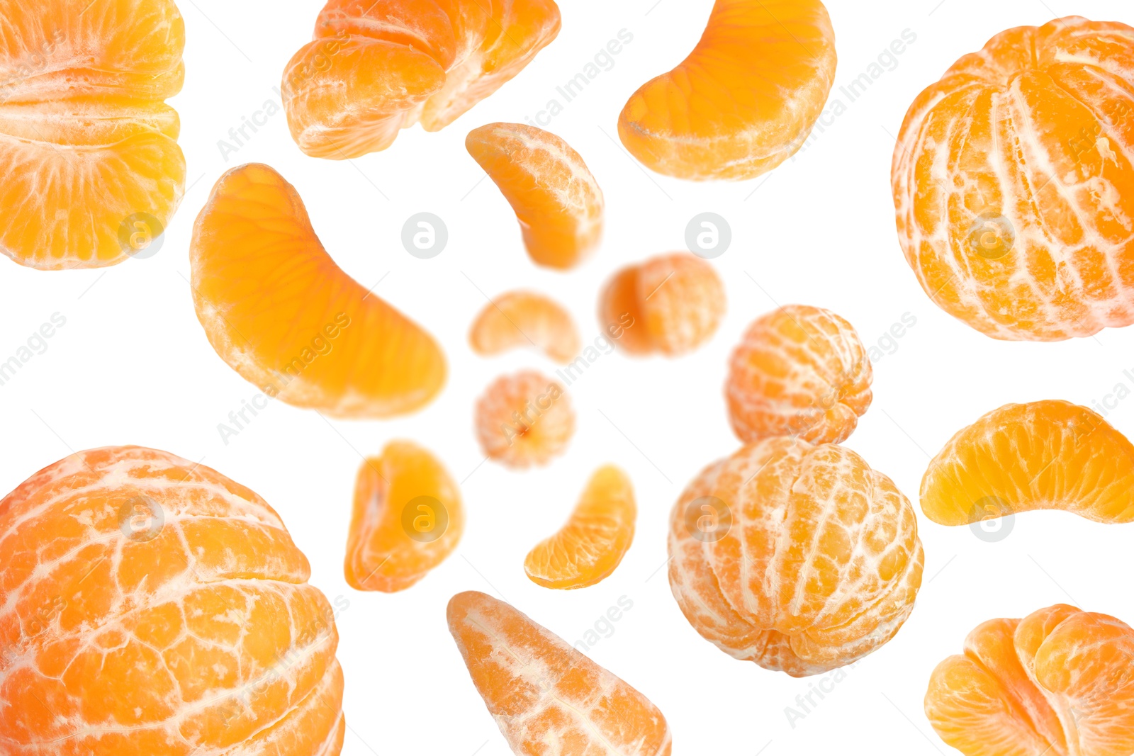 Image of Sweet tangerines whirling in air against white background