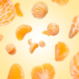 Image of Sweet tangerines whirling in air against beige gradient background