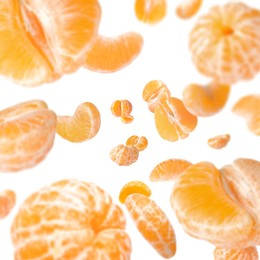 Image of Sweet tangerines whirling in air against white background