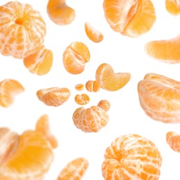 Image of Sweet tangerines whirling in air against white background
