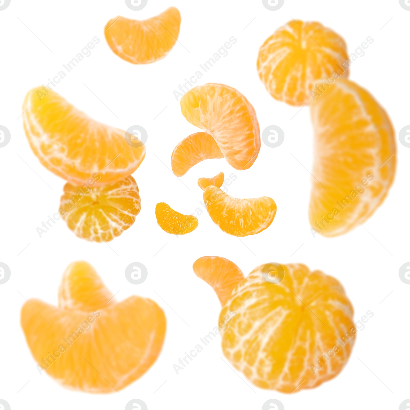 Image of Sweet tangerines whirling in air against white background