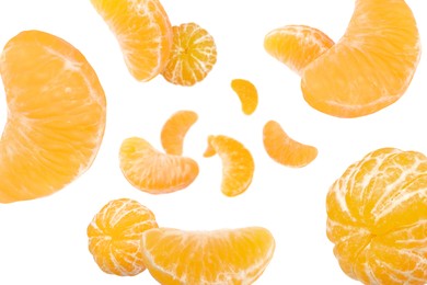 Image of Sweet tangerines whirling in air against white background