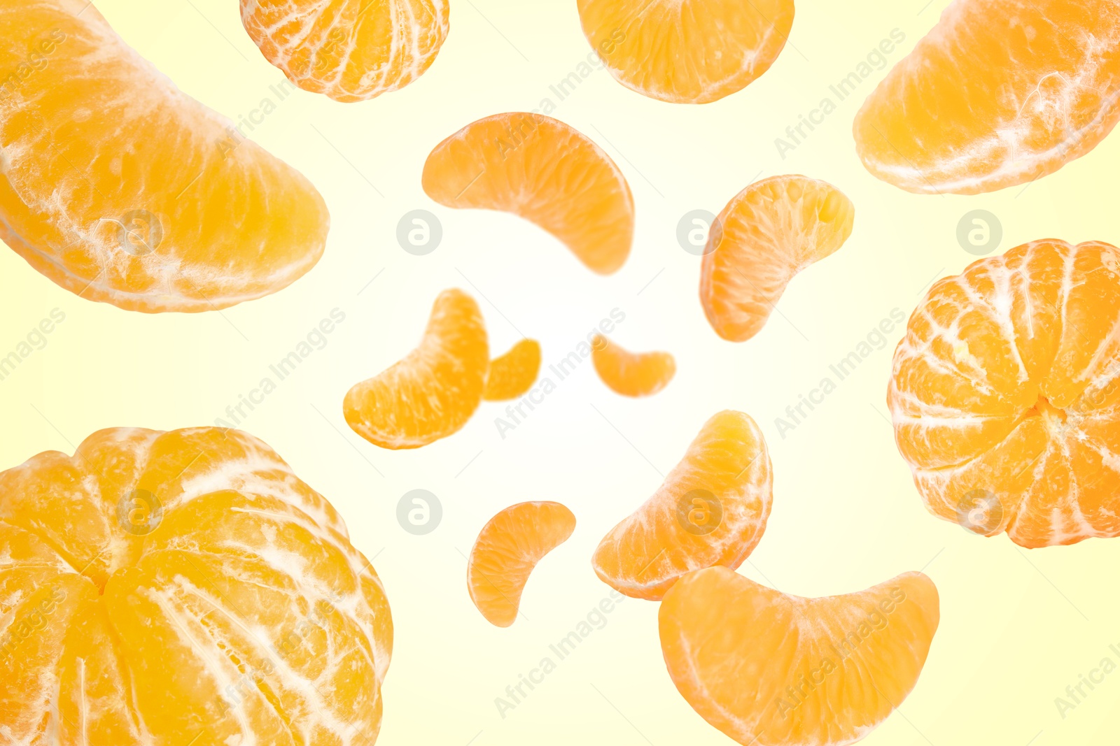 Image of Sweet tangerines whirling in air against beige gradient background