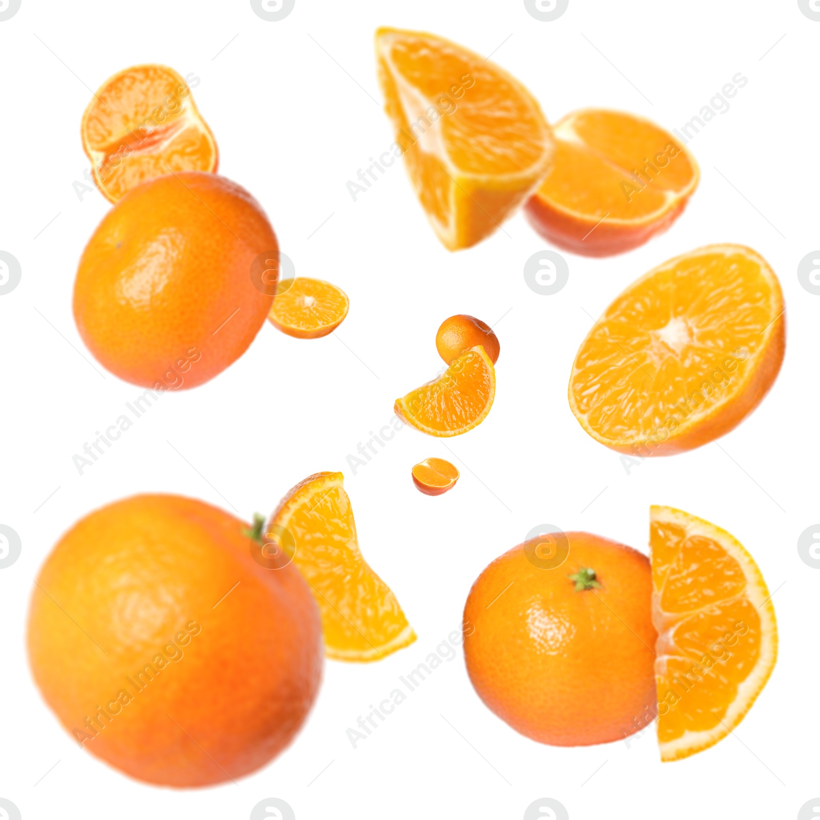 Image of Sweet tangerines whirling in air against white background