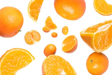 Image of Sweet tangerines whirling in air against white background
