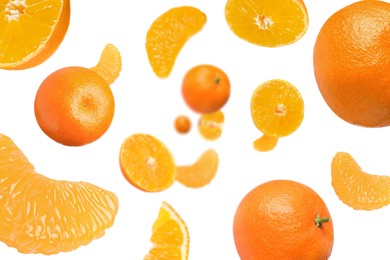 Image of Sweet tangerines whirling in air against white background