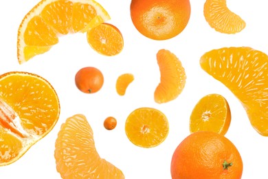 Image of Sweet tangerines whirling in air against white background